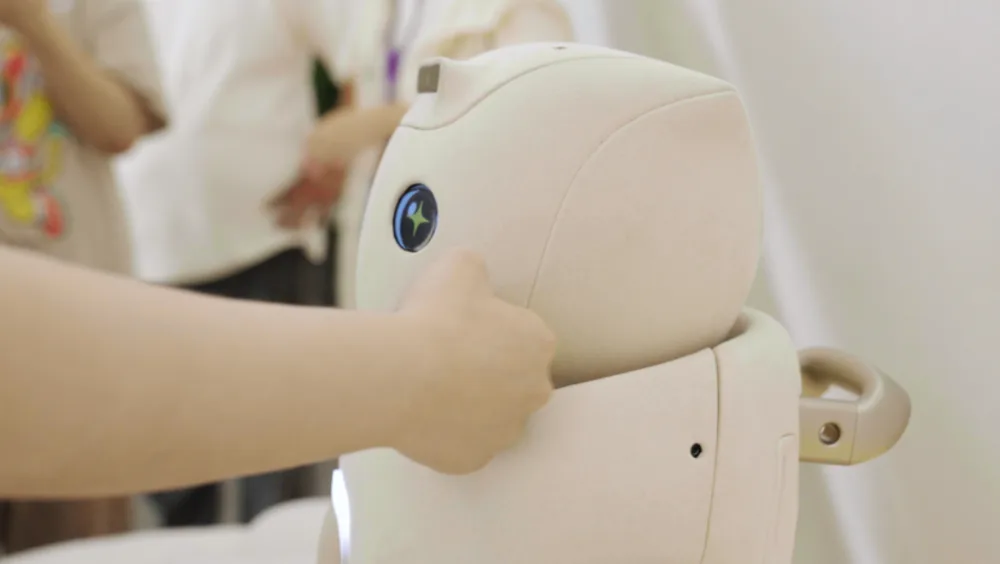 Fourier GR-3 humanoid robot touch interaction and emotional response demo
